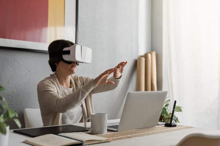 Young architect woman using vr headset for real estate virtual reality tour development